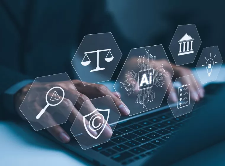 Hand typing on laptop with digital icons representing artificial intelligence, legal standard, ethics, and regulatory compliance, Technology law and policy, copyright,