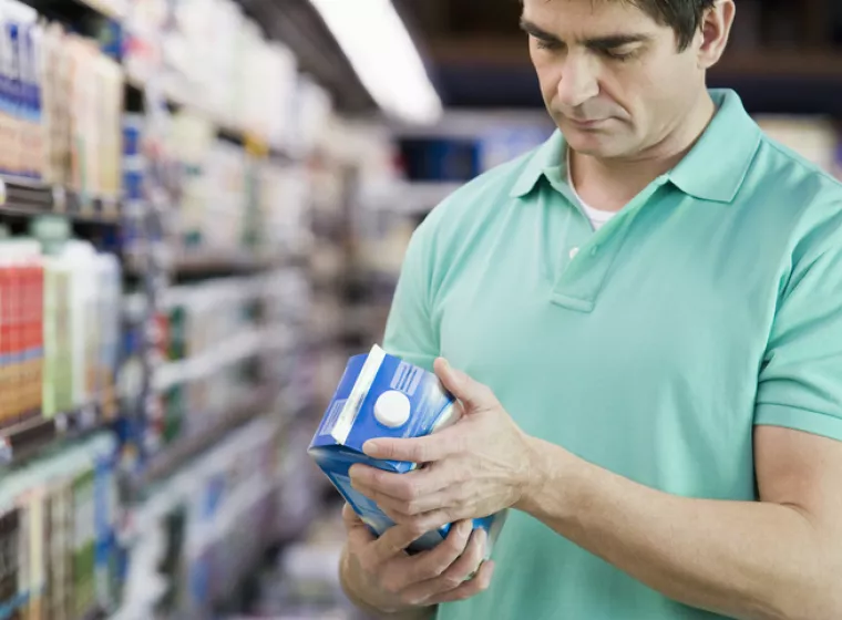 Man Reading Food Label