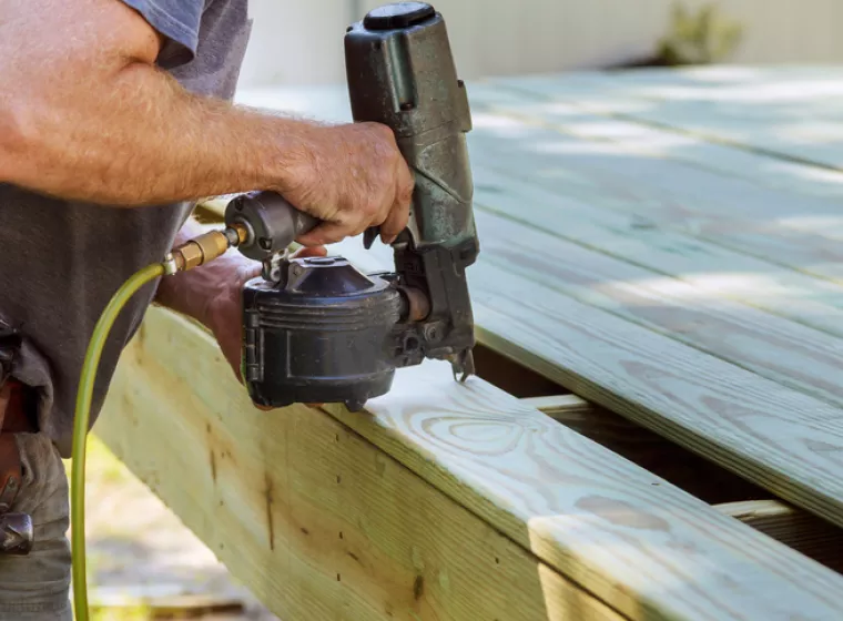 Man with Nail Gun