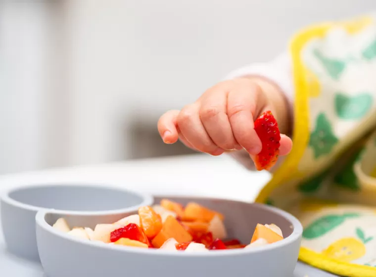 Baby Eating Fruit