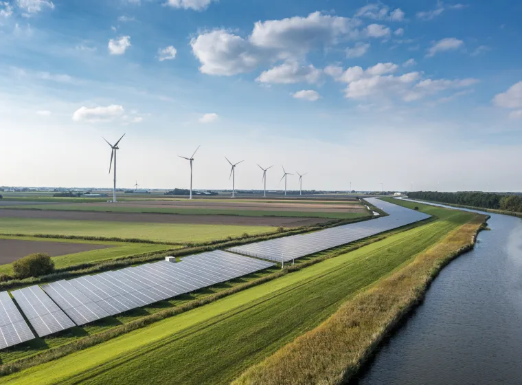 Solar panels and wind turbines generating renewable energy for green and sustainable future.