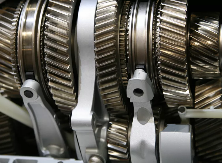 Artistic photo of mechanical gears. Exponent provides mechanical engineering support for disputes and claims.  