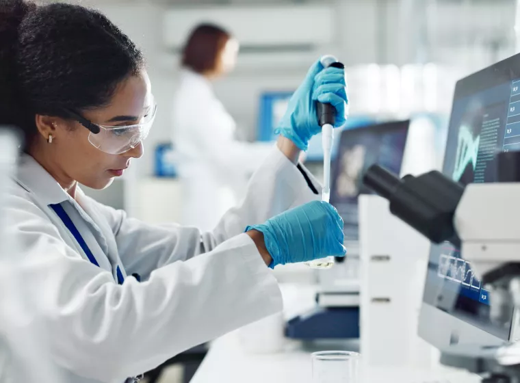 Test tubes, dropper and woman scientist in laboratory for medical study, research or experiment