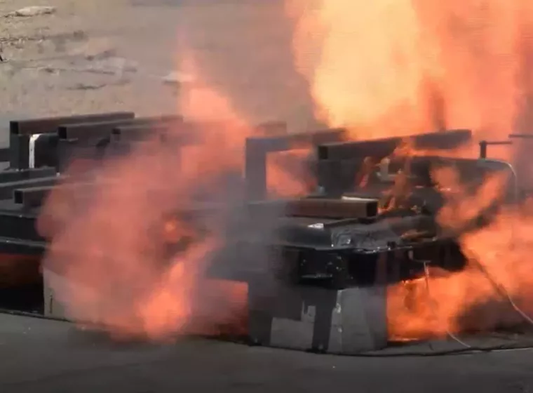 Vehicles engulfed in flames at Exponent's Testing and Research Center in Phoenix, AZ