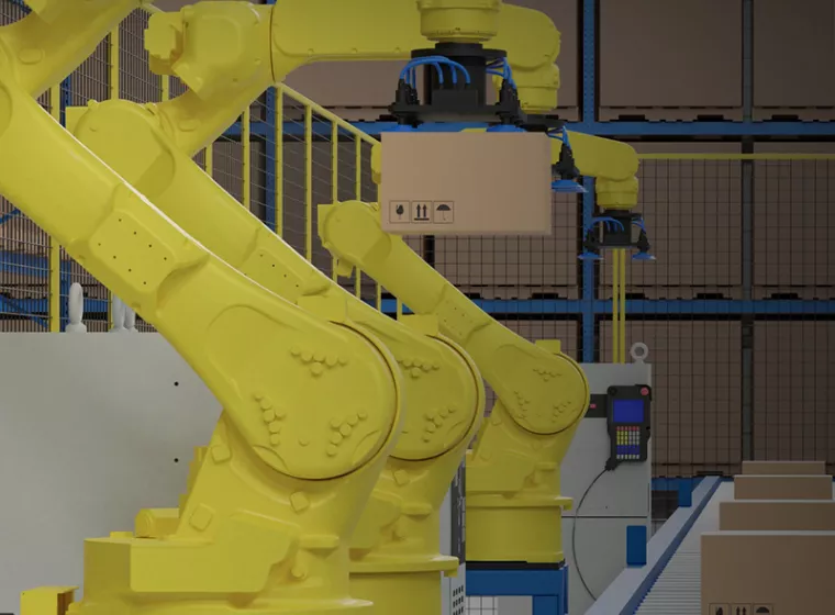 Large robotic armed machinery loads boxes in warehouse setting. Exponent helps clients push the boundaries of technology.