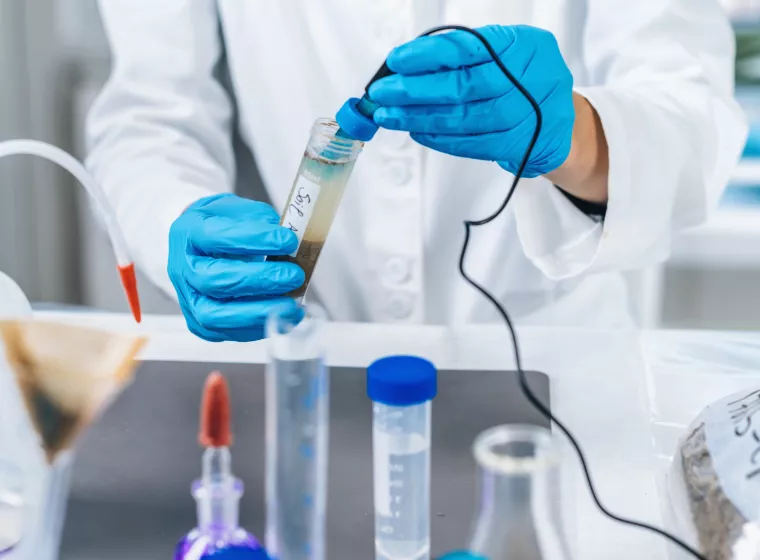 Scientist checking soil pH