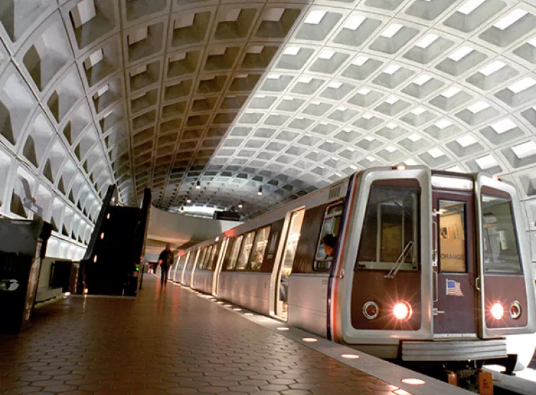 Underground passenger train in brightly lit tunnel. Exponent helps improve the safety and efficiency of all transport systems.