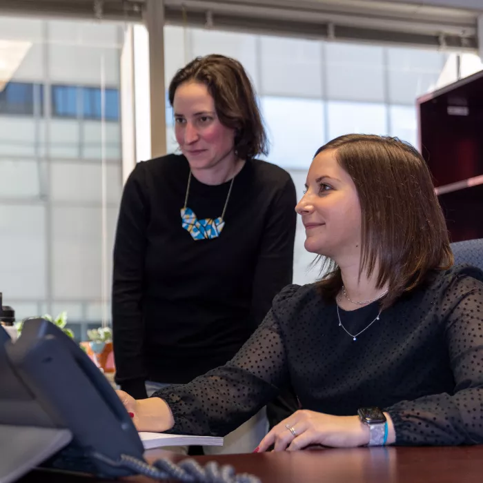 Two Employees Working