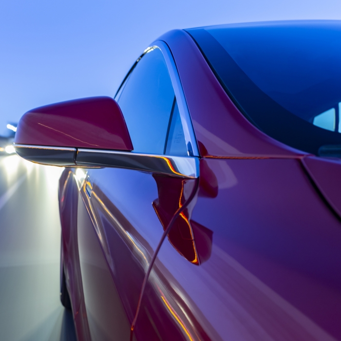 Close up shot of a car from the passenger side