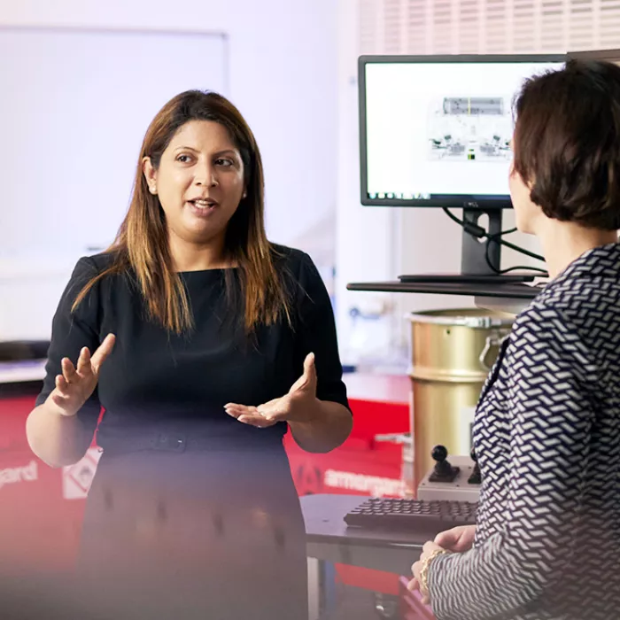 Two business women meeting in a lab