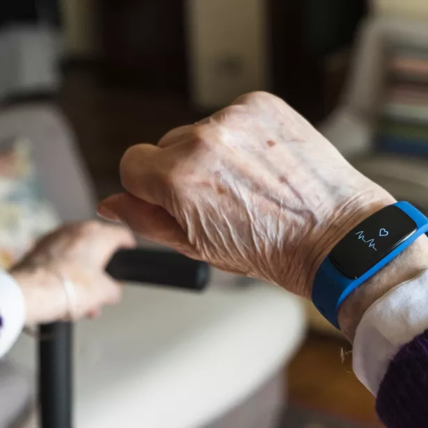 Elderly woman hand and detail of the smartwatch