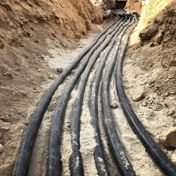 The high voltage electrical cable is laid in a trench
