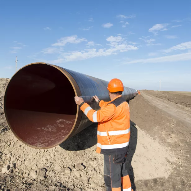 Workers at gas pipeline construction site.