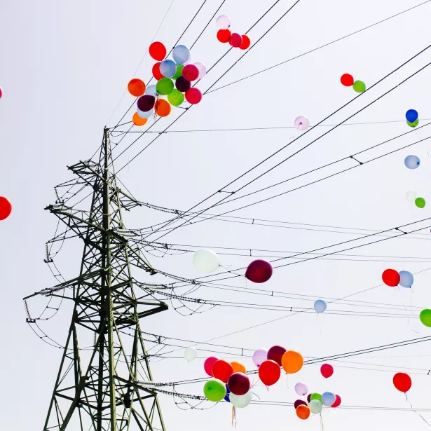 Balloons flying through electrical power lines