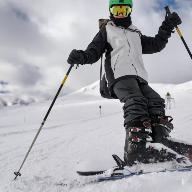 Teenage boy skiing at ski resort in the Alps