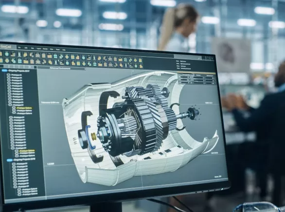 Car Factory Office: Engineer Working on Turbine Prototype on Computer,