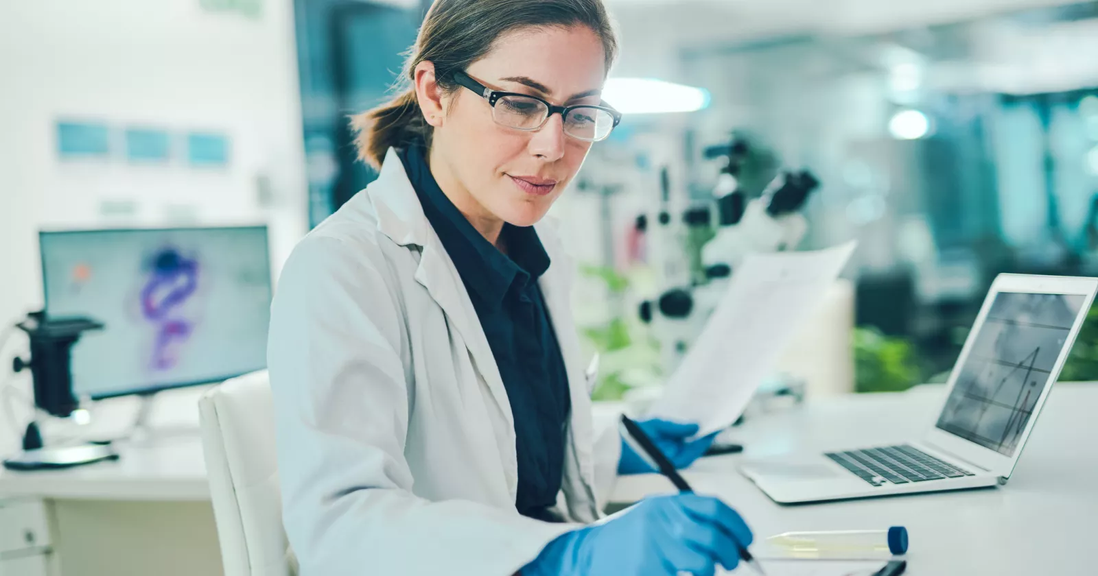 Woman scientist writing