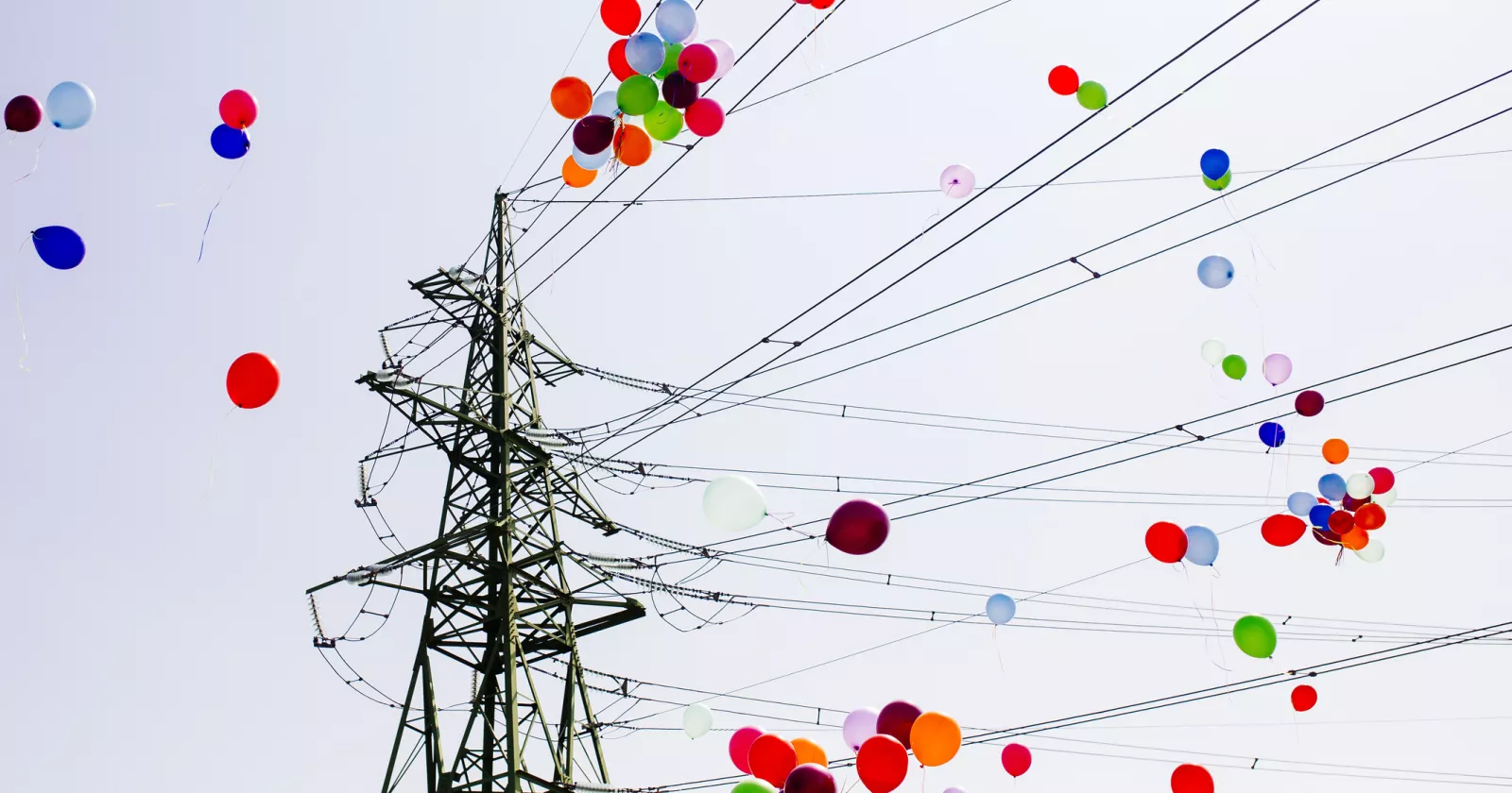 Balloons flying through electrical power lines