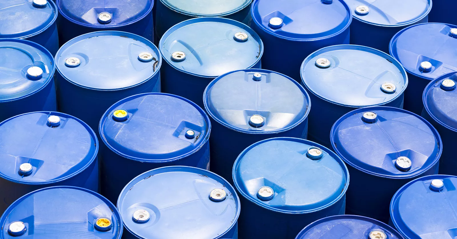 Chemicals in blue drum barrels. Exponent test and chemicals to help develop prevent fire hazards. 