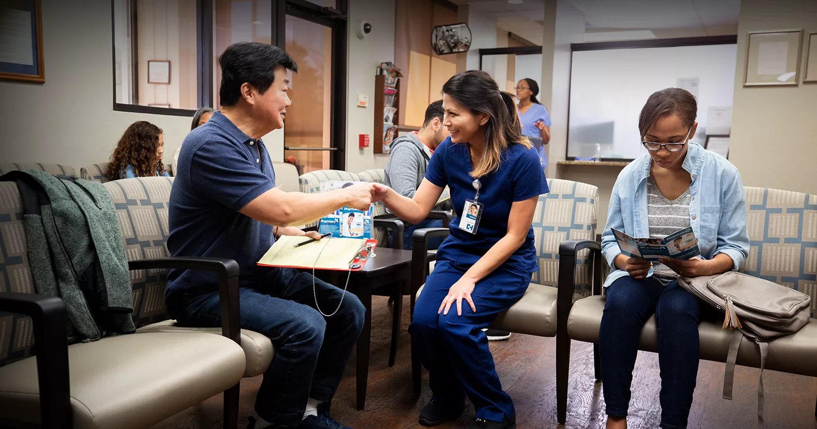 A medical professional shakes hands with a patient. Exponent gathers real world data and evidence to improve health science initiatives. 