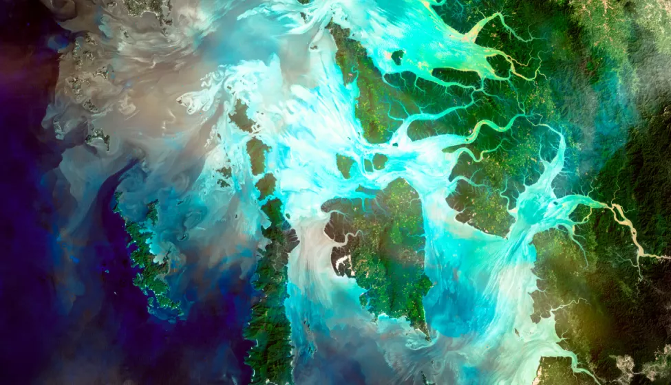 Bird's eye view of a portion of Earth showing the sea and land, with various islands and river systems