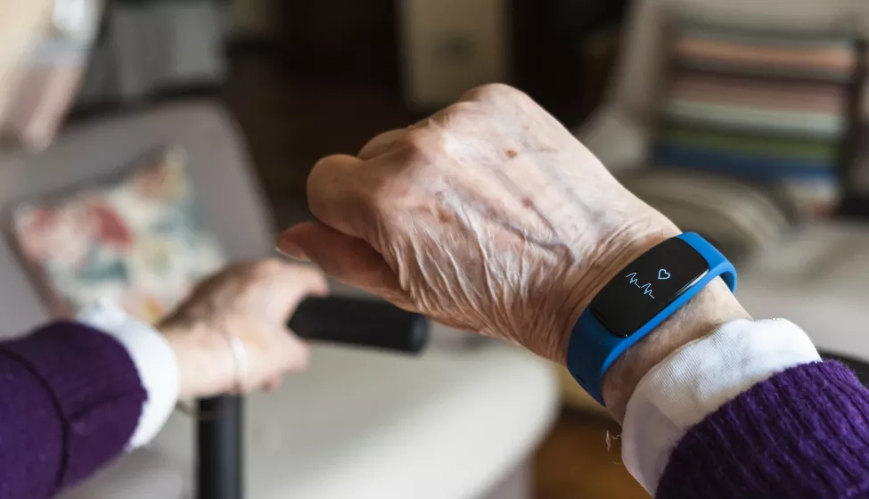 Elderly woman hand and detail of the smartwatch