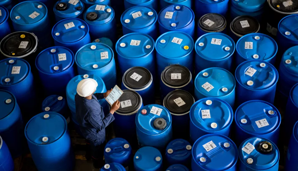 Worker does inventory at a chemical plant