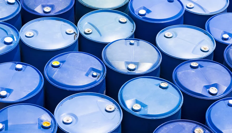 Chemicals in blue drum barrels. Exponent test and chemicals to help develop prevent fire hazards. 