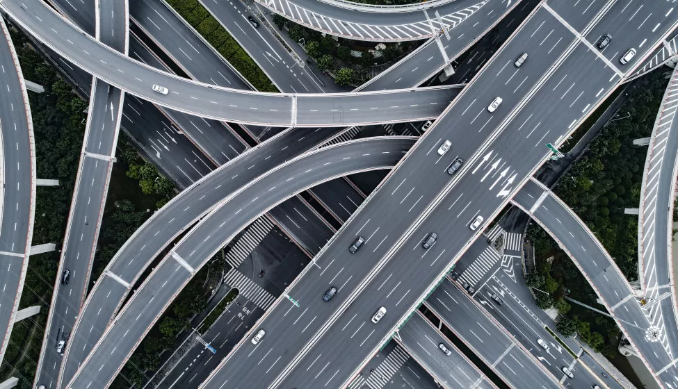 Aerial view of highway and overpass in city