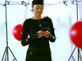 Test subject in Exponent UX research laboratory as research examine the effects of distractions during cell phone use.