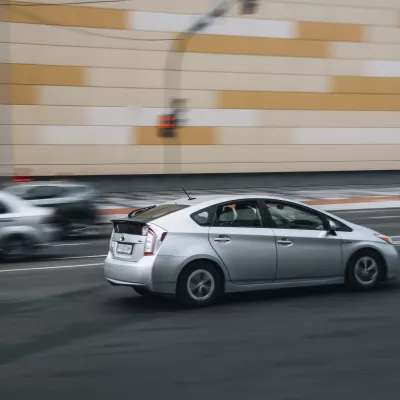 Car driving down a road