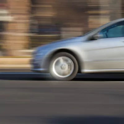 car accelerating down a road